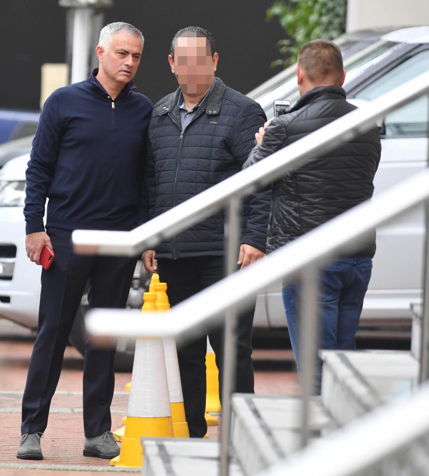 Jose Mourinho posed for a picture with a fan as he left the Lowry Hotel