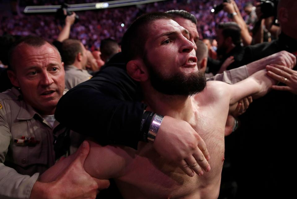 Khabib sparked a mass brawl after attacking McGregor's stablemate Dillion Danis at ringside