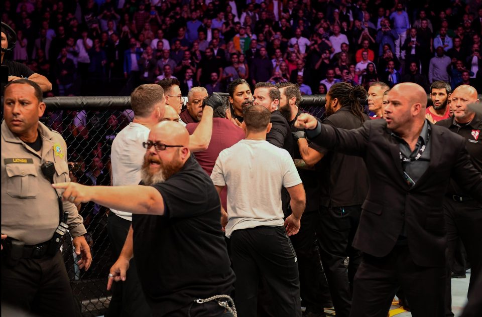 Chaos reigned inside and outside the Octagon after McGregor tapped out in the fourth round