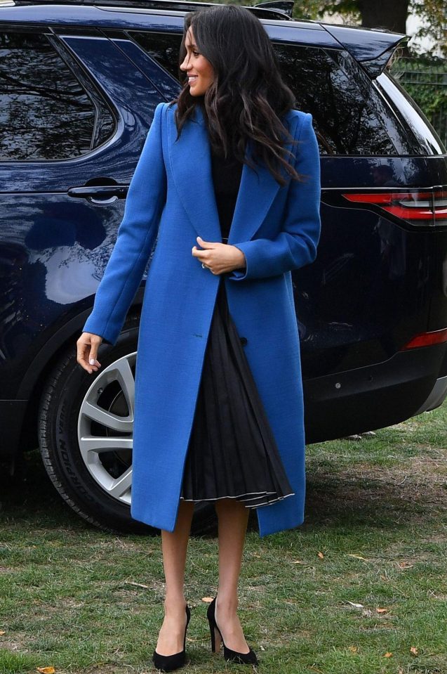  Wearing a blue Smythe coat at the Kensington Palace Launch of 'Together: Our Community Cookbook'