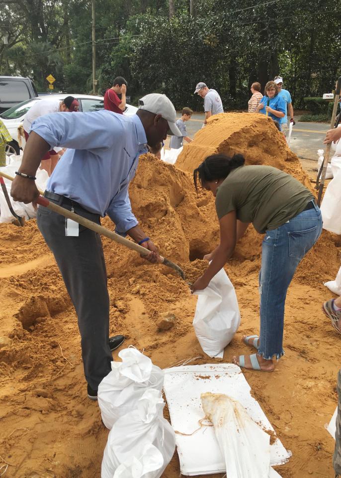  Families in Tallahassee fill sandbags ahead of Hurricane Michael's arrival