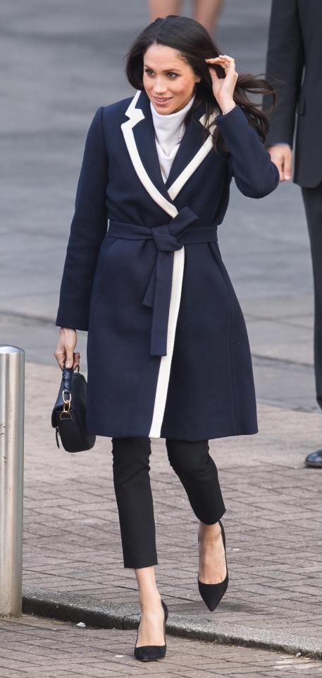  Wearing a stylish navy coat at Millennium Point in Birmingham