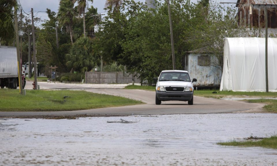 The storm surge is starting to push the Apalachicola River over the roads ahead of the arrival of of Hurricane Michael