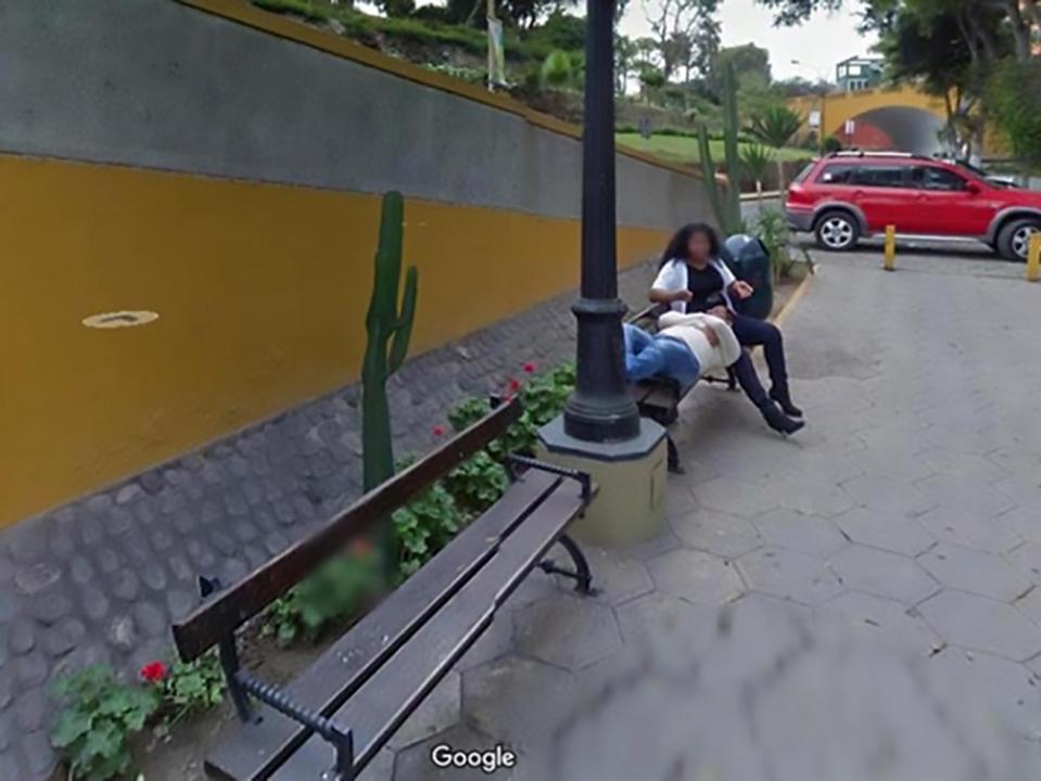 The compromising photo showed her sitting on a bench with a man's head in her lap, as she appeared to be stroking his hair