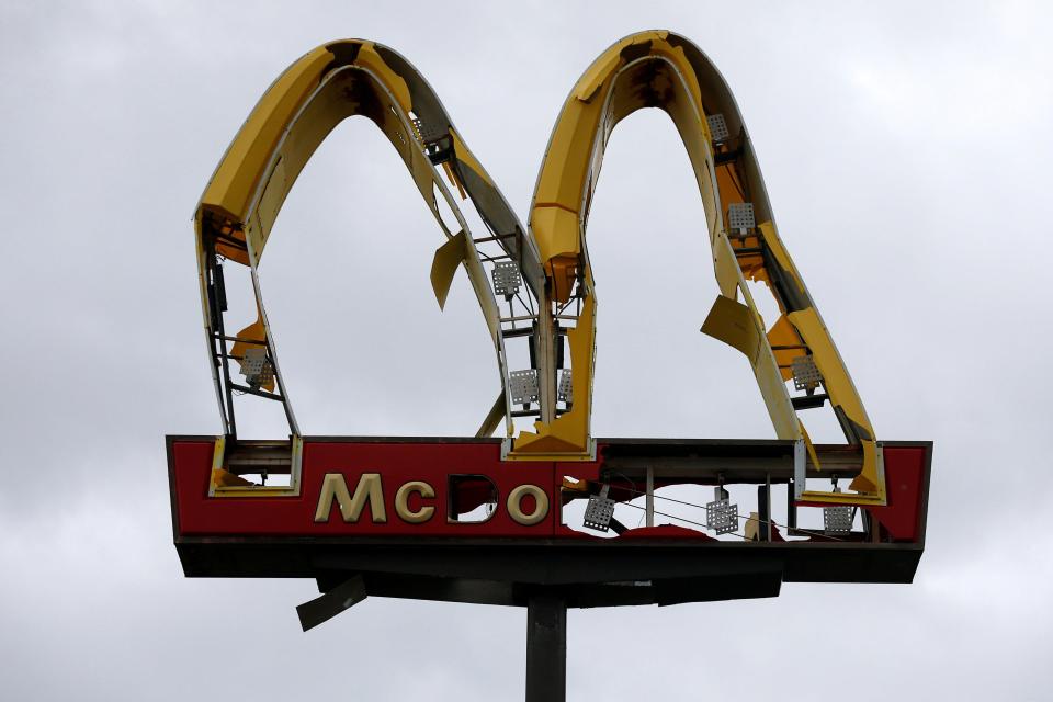  What is left of a McDonald's sign after Hurricane Michael has ripped through Panama City