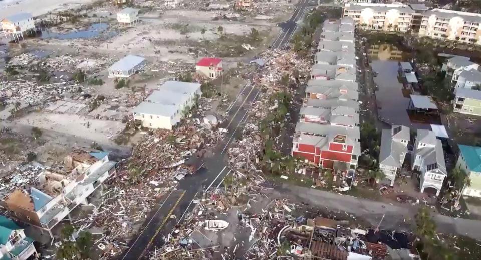  An aerial view shows debris strewn through the streets of Mexico Beach, Florida