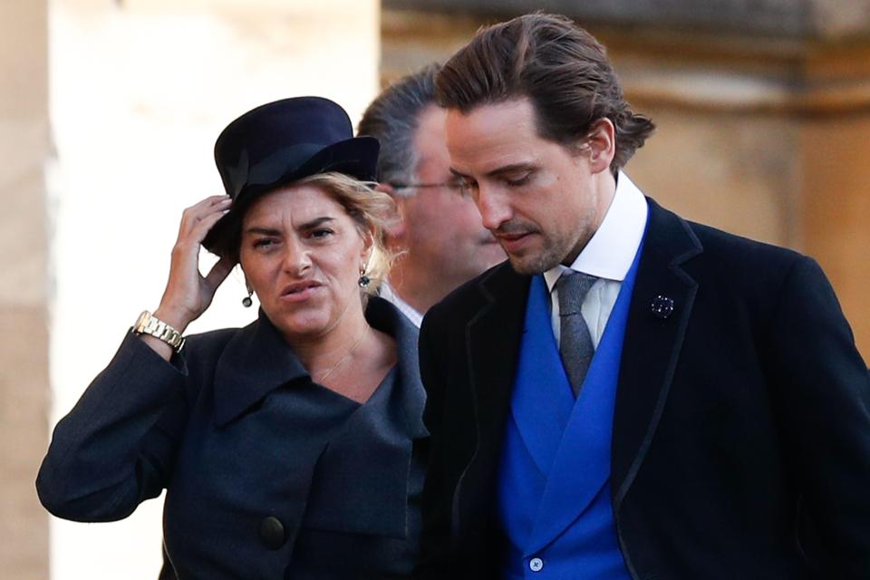  Tracey Emin appeared to be concentration on holding on to her hat