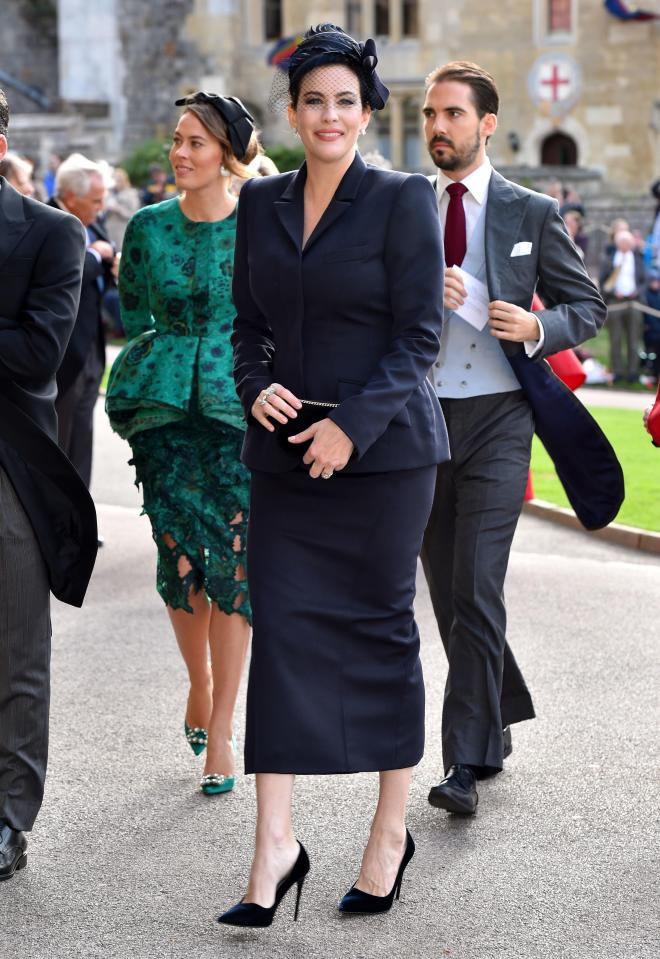  Liv Tyler looked sensational in her skirt suit