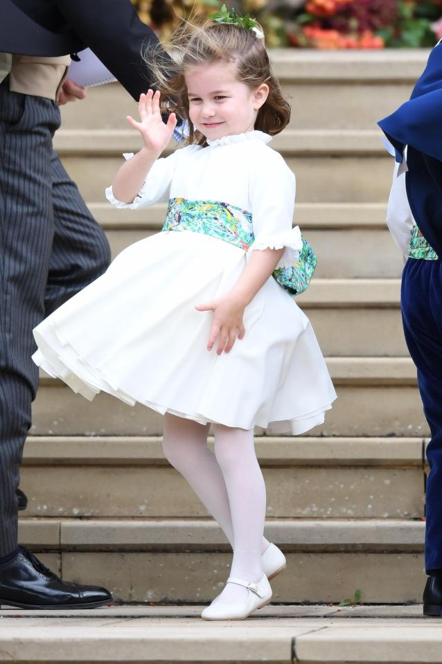  Princess Charlotte waving to the crowds