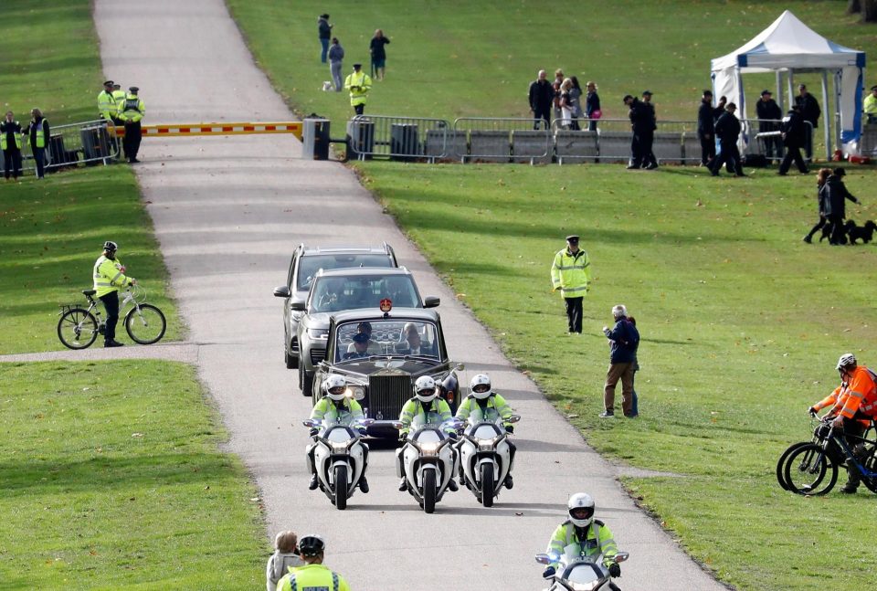  Long sections of the roadside security barriers in the shadow of Windsor Castle remained devoid of royal fans