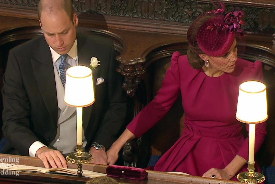  The Duchess of Cambridge placed her hand on her husband's lap in an unusual public display of affection for the couple