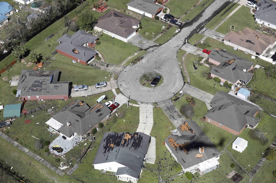  Damage to roofs can be seen in this image