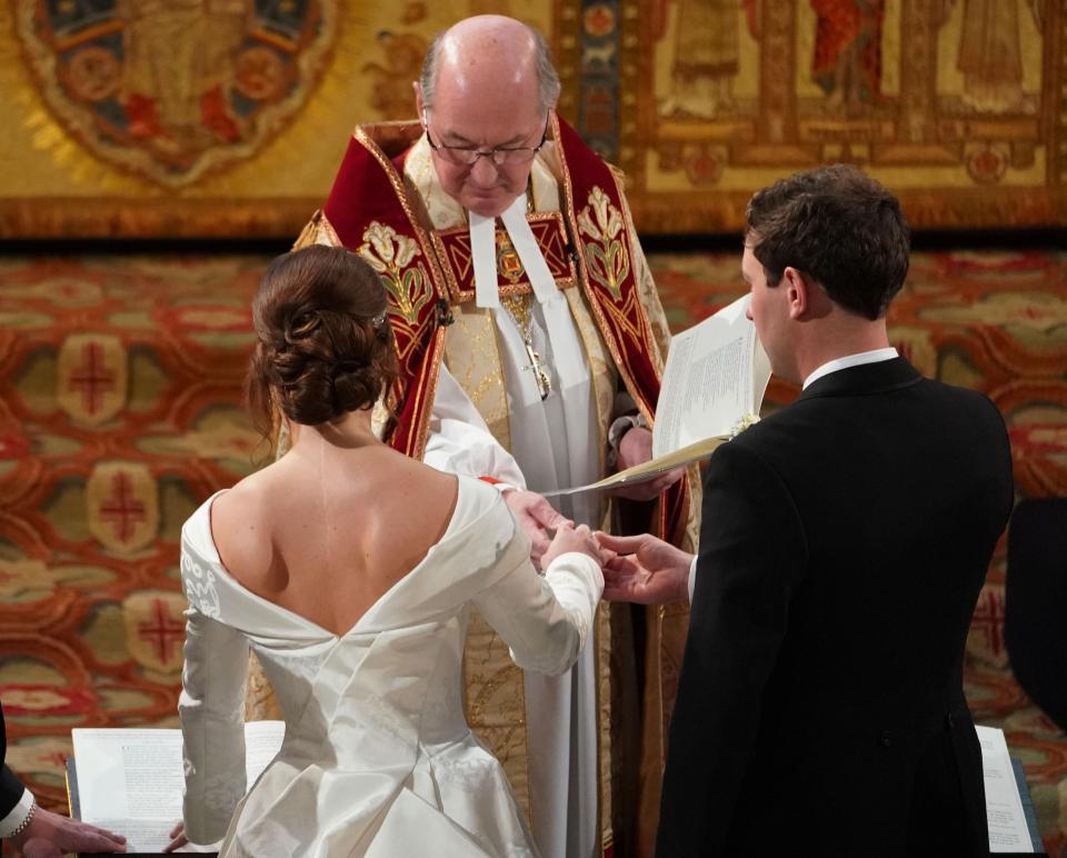  The bride requested to have a lower back on her dress to show the scars from her childhood surgery