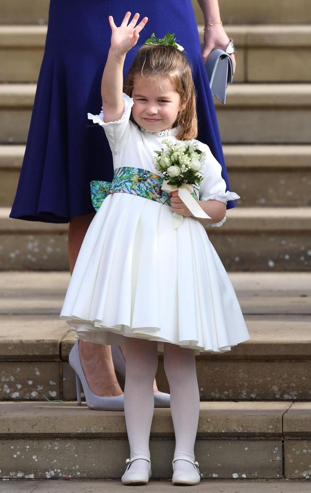  Princess Charlotte gave members of the public a little wave before heading into the chapel