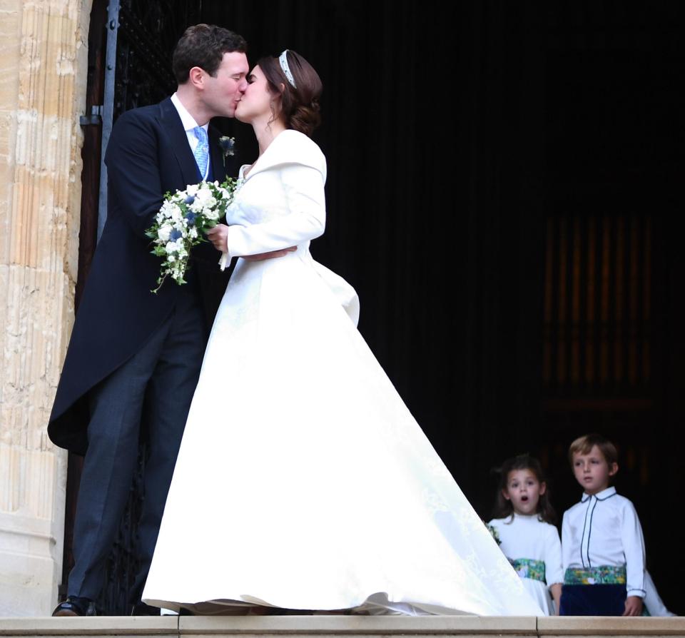  The pair lovingly kissed eachother as they exited the chapel as man and wife for the first time