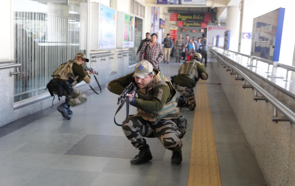  Armed officers pictured during a mock drill. There are security concerns that cheery security staff could be perceived as lax security and a higher risk of terror attacks