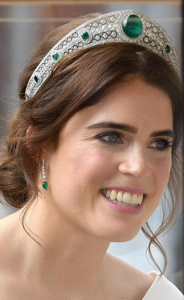  The princess wore matching earrings to go with her emerald tiara