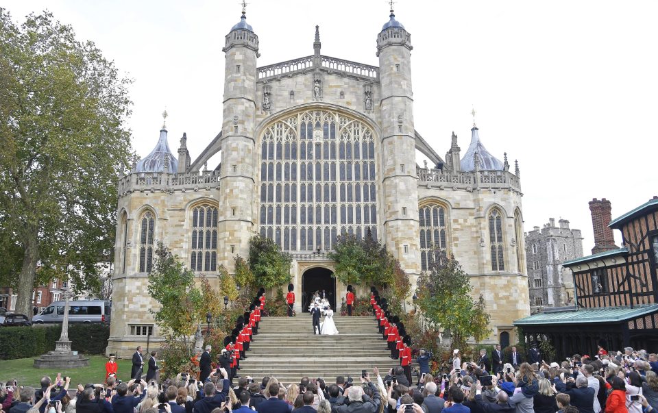  Crowds cheered as Princess Eugenie kissed her new husband, Jack Brooksbank after they tied the knot in a romantic ceremony at Windsor