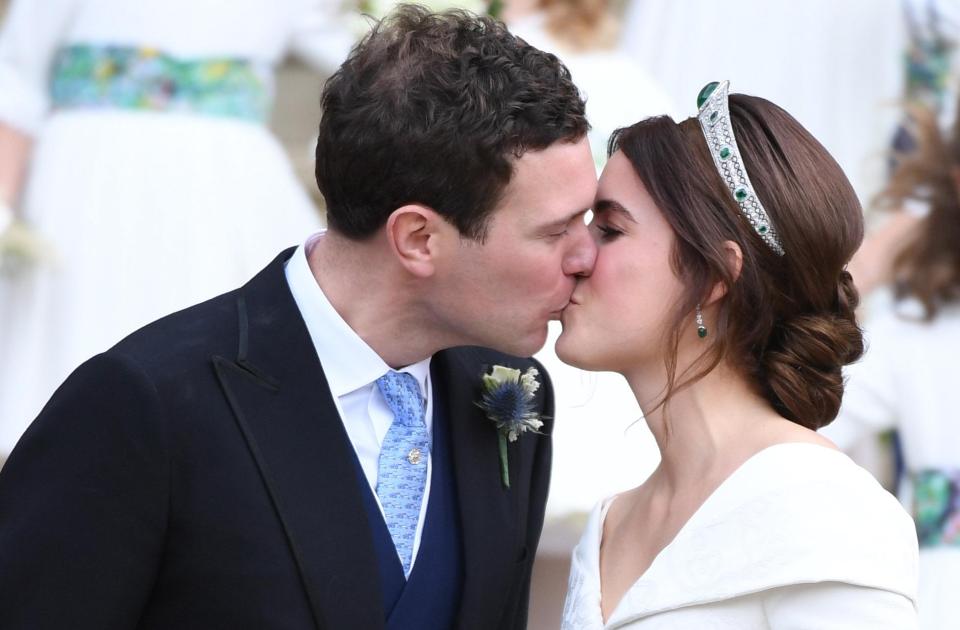  Eugenie and Jack seal it with a kiss that was described as 'more intimate' than other royal kisses