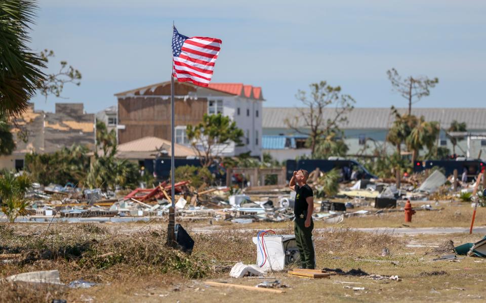  It has also been degraded to a tropical storm - but not before tearing through homes and ripping roofs off buildings