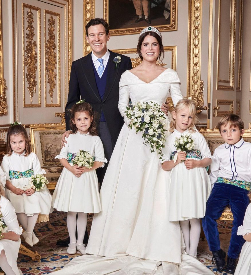  In the cute shot, Jack Brooksbank is right next to Robbie Williams' daughter Theodora, and Princess Charlotte has her legs neatly crossed