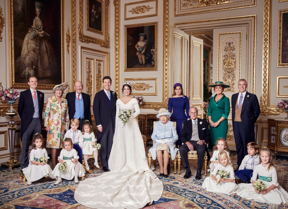 Princess Eugenie and Jack Brooksbank pose with the Queen, Prince Philip, their parents and bridal party, Mia is pictured on the front row, second from the left