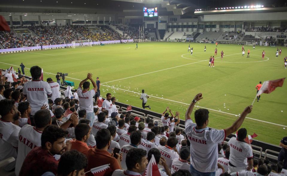 Fans faced stifling temperatures but Qatar authorities are promising new stadiums for 2022