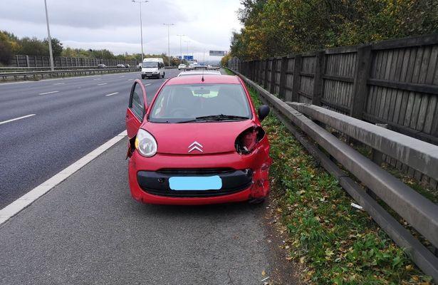  The car was missing a wing mirror and a head light