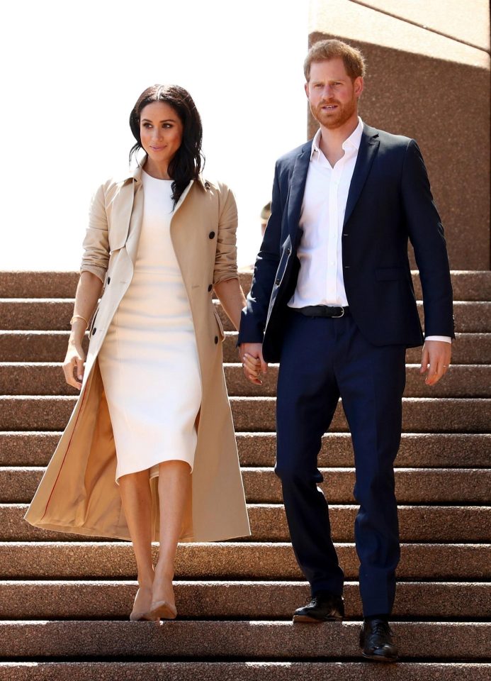  Meghan also wore a coat with the white dress at the Sydney Opera House