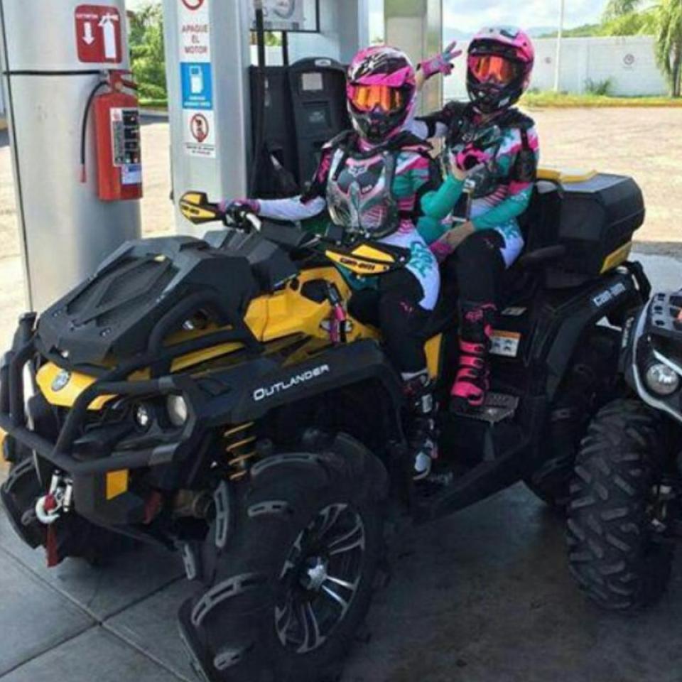 These youngsters pass the time of day by riding their top of the range quad bike 