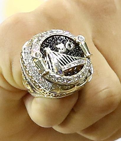 The Golden State Warriors showed off their reversible NBA title ring last night