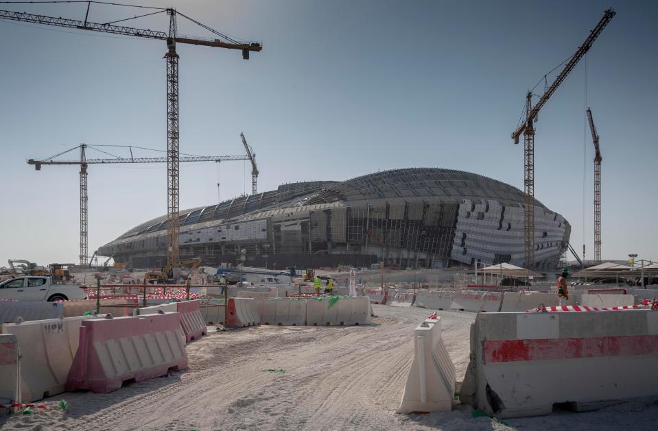 At the Al Wakrah Stadium, nine miles from Doha, the seats are already going in