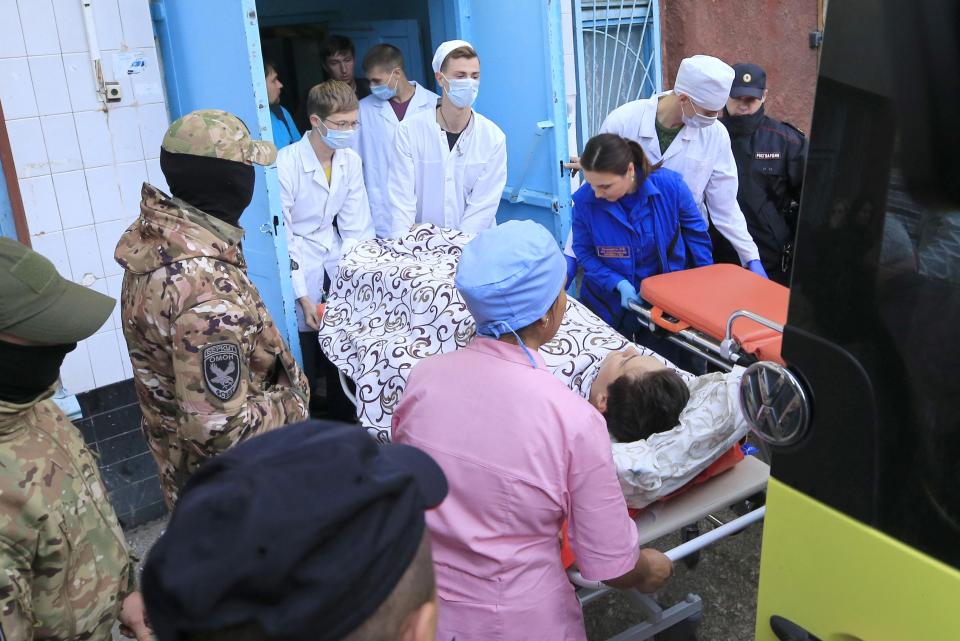 A injured teenager arriving at No1 Pirogov Hospital in the city of Kerch