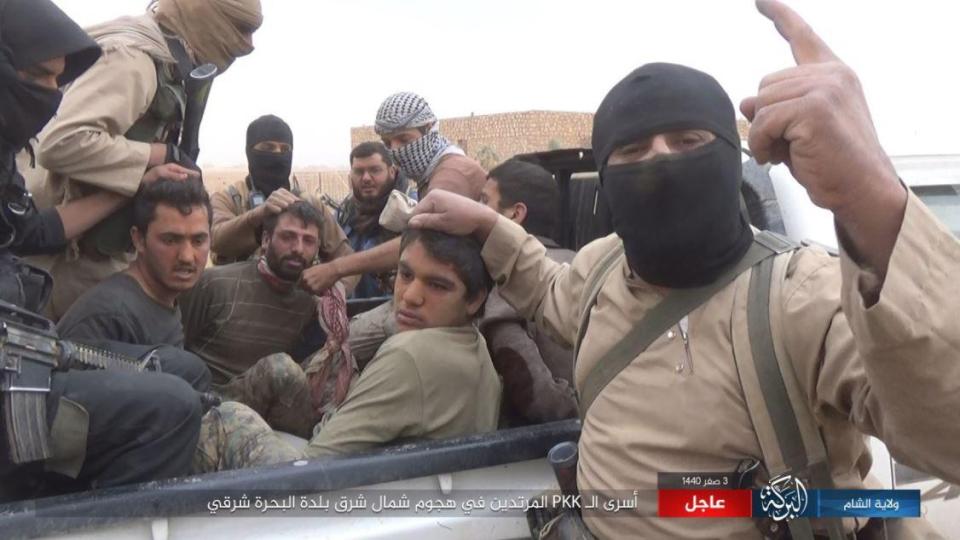  Pictures have emerged of ISIS fighters and hostages in Syria