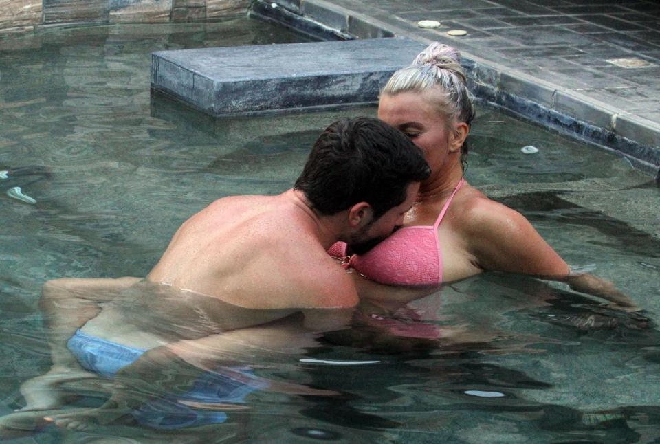 Kerry Katona and her new man Ryan Mahoney got hot and heavy in the pool during their holiday in Thailand today