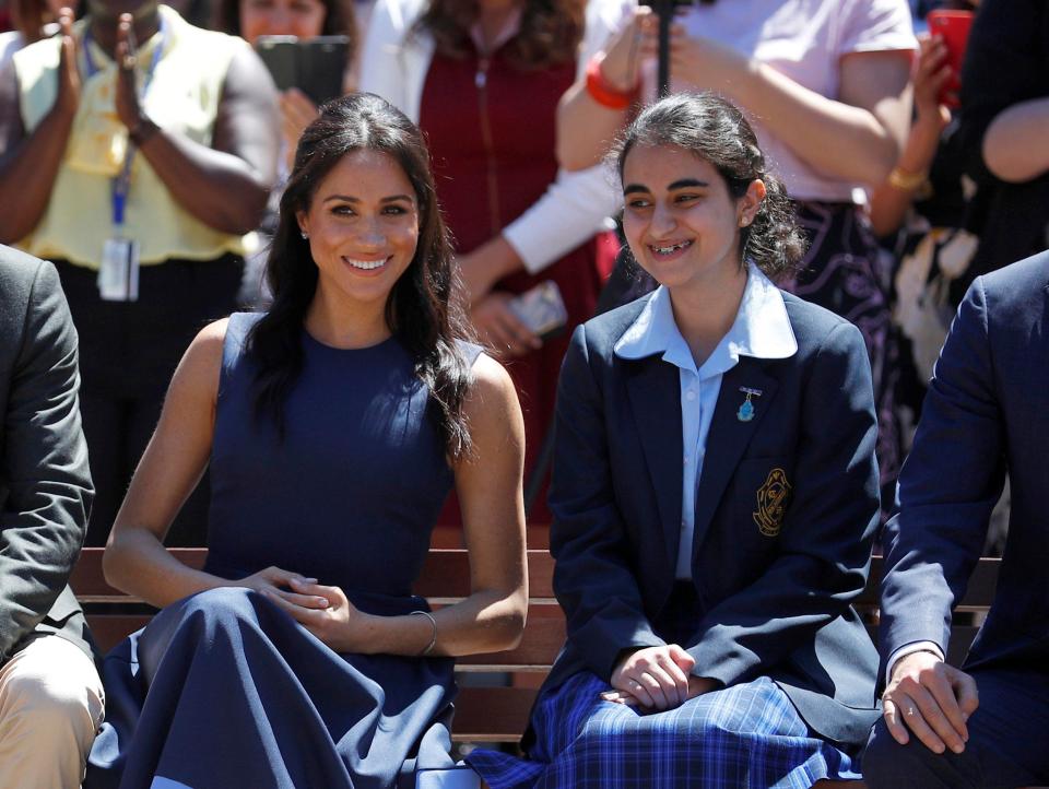  Duchess of Sussex watches a performance during their visit to Macarthur Girls High School in Sydney