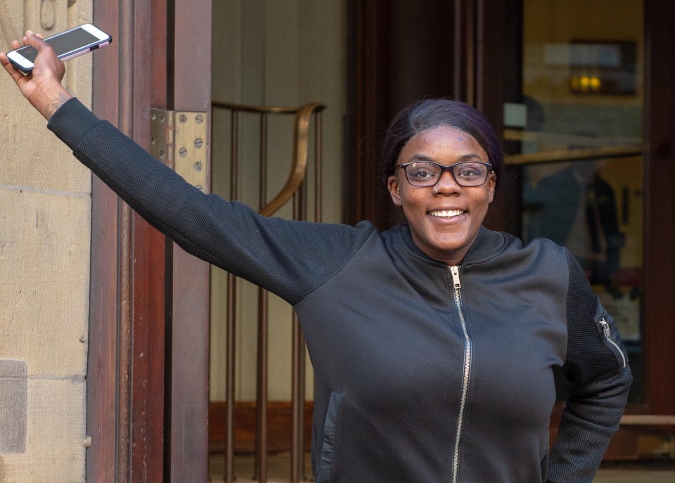 Millicent Barnes smiled as she left court moments after sobbing when she was found not guilty of threatening to stab a baby