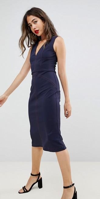  The simple and clean lines of this navy pencil dress will take you from office to party with ease