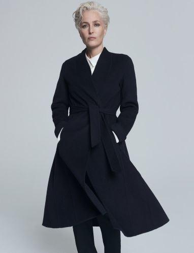  Meghan's swing coat was designed by X-Files star turned fashion designer Gillian Anderson