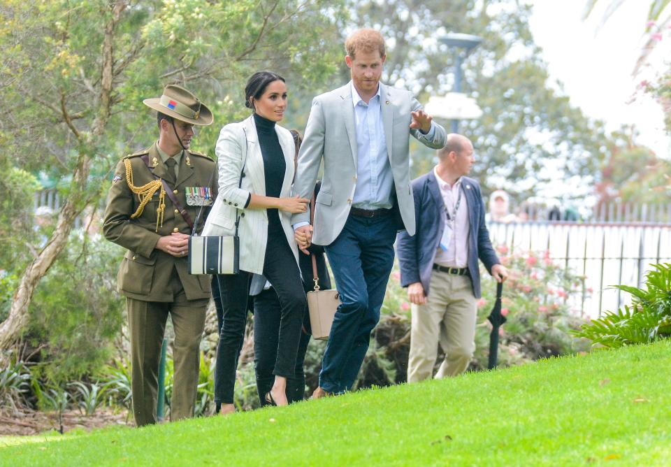  Harry and Meghan were escorted to the lunch meeting