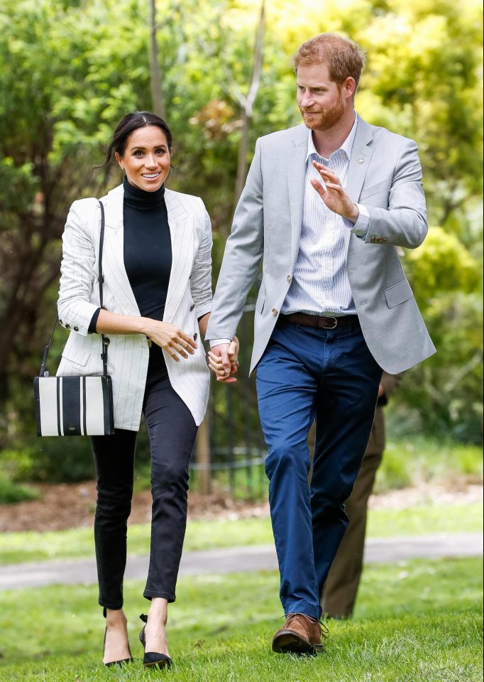  The pair look happy to be reunited after Meghan missed her morning appointments