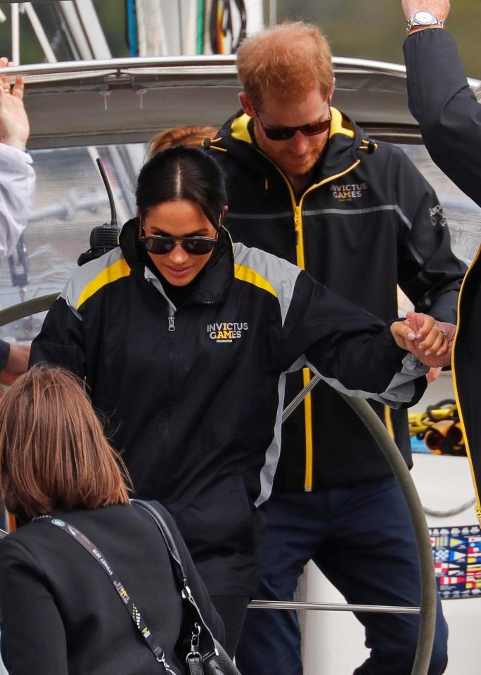  All aboard - the royals disembark their boat