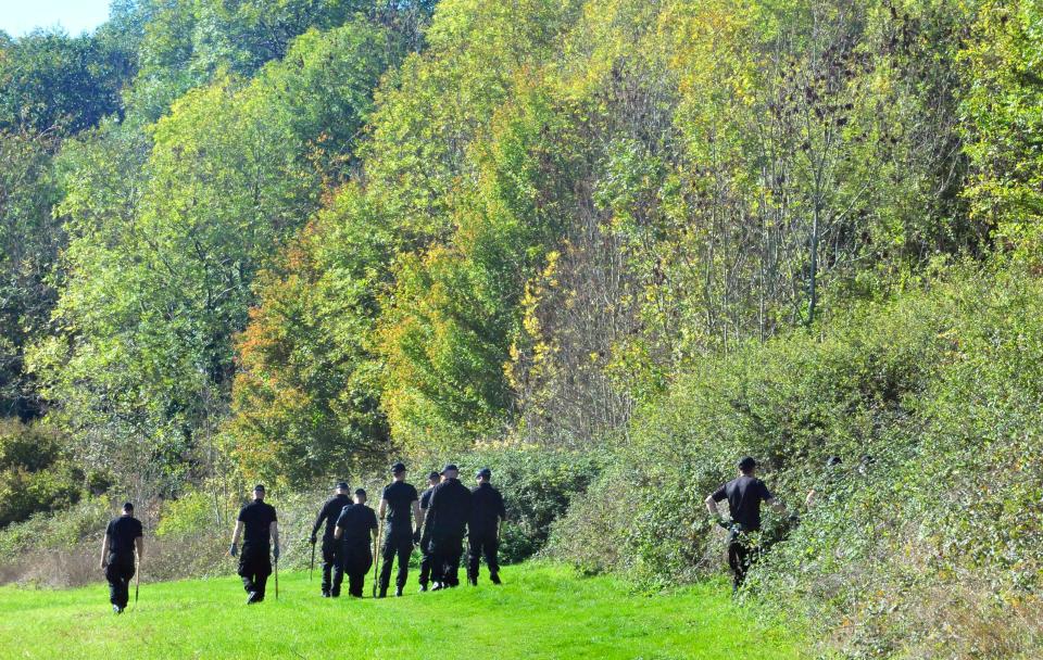  Police continue to search woodland and fields near the home of the missing mother