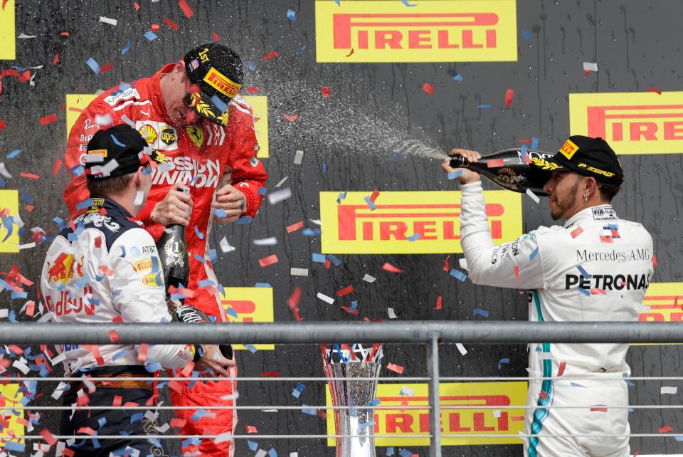  Lewis Hamilton congratulates the race victor in the tradition F1 way