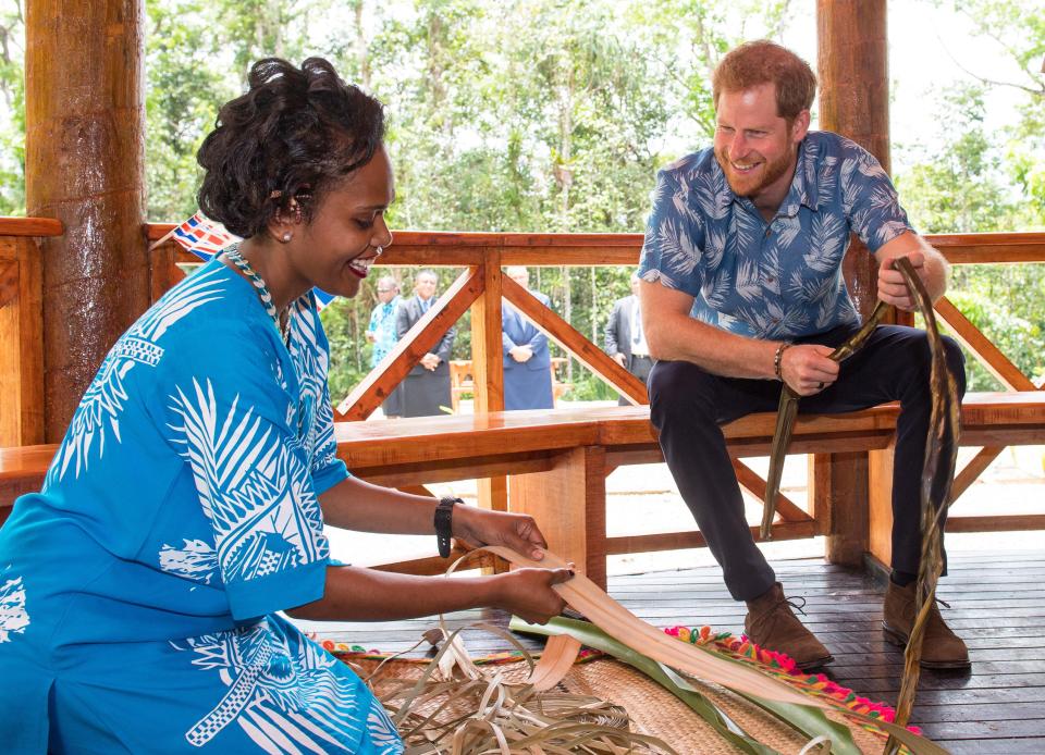  The Duke of Sussex watches a demonstration of traditional mat weaving as he attends a dedication of the Colo-i-Suva forest to the Queen's Commonwealth Canopy in Suva