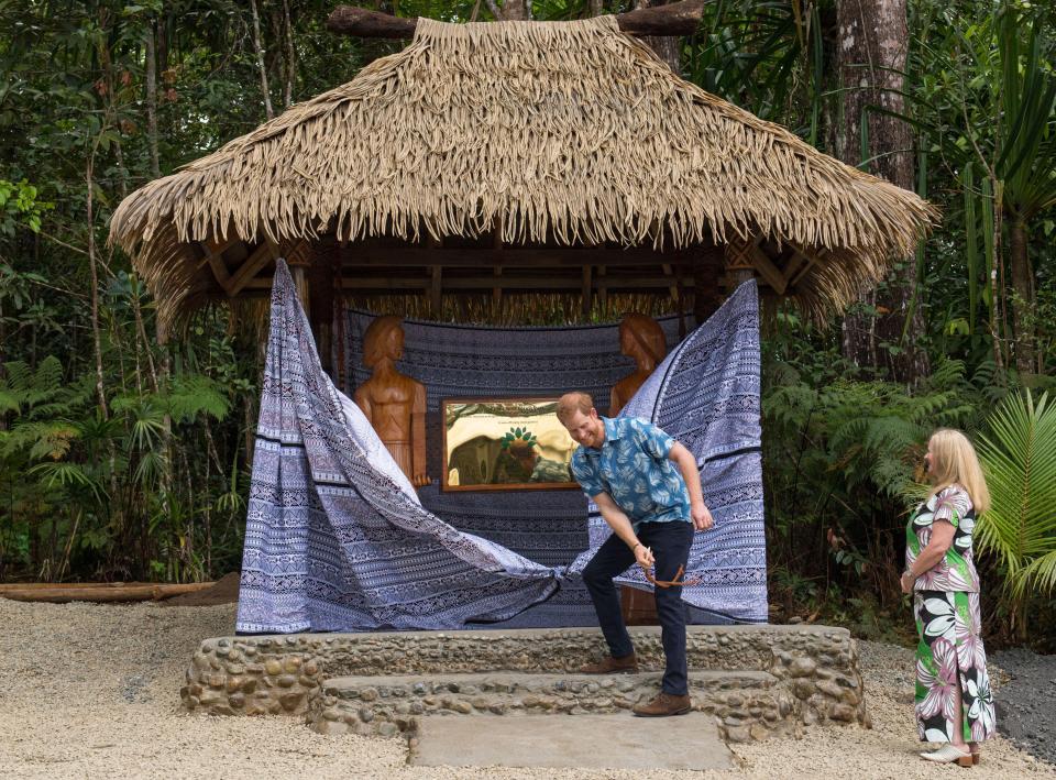  Harry unveils a plaque on day two of the royal couple's visit to Fiji