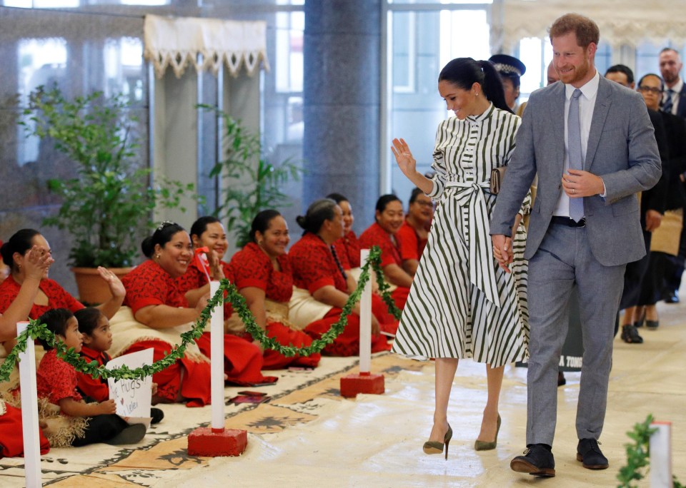 Meghan wore a green and white dress by Australian-born fashion designer Martin Grant