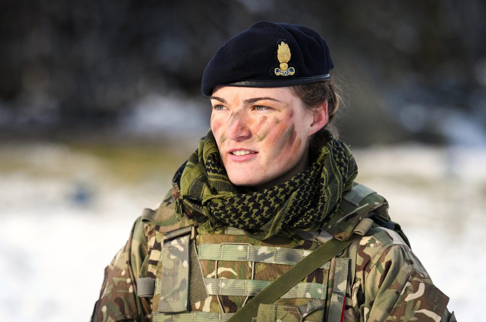  Lt George from the Royal Engineers speaks to a colleague as she takes part in pre-exercise integration training