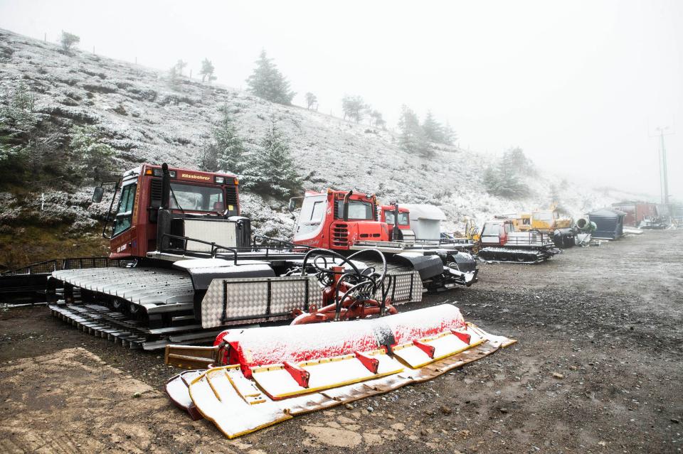  Early winter snow on piste grooming machines at The Lecht Ski Centre, Aberdeenshire, today