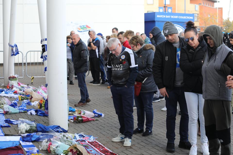  Team scarves were laid out amongst the tributes